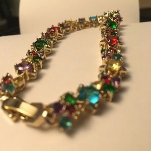 Like new jeweled gold bracelet